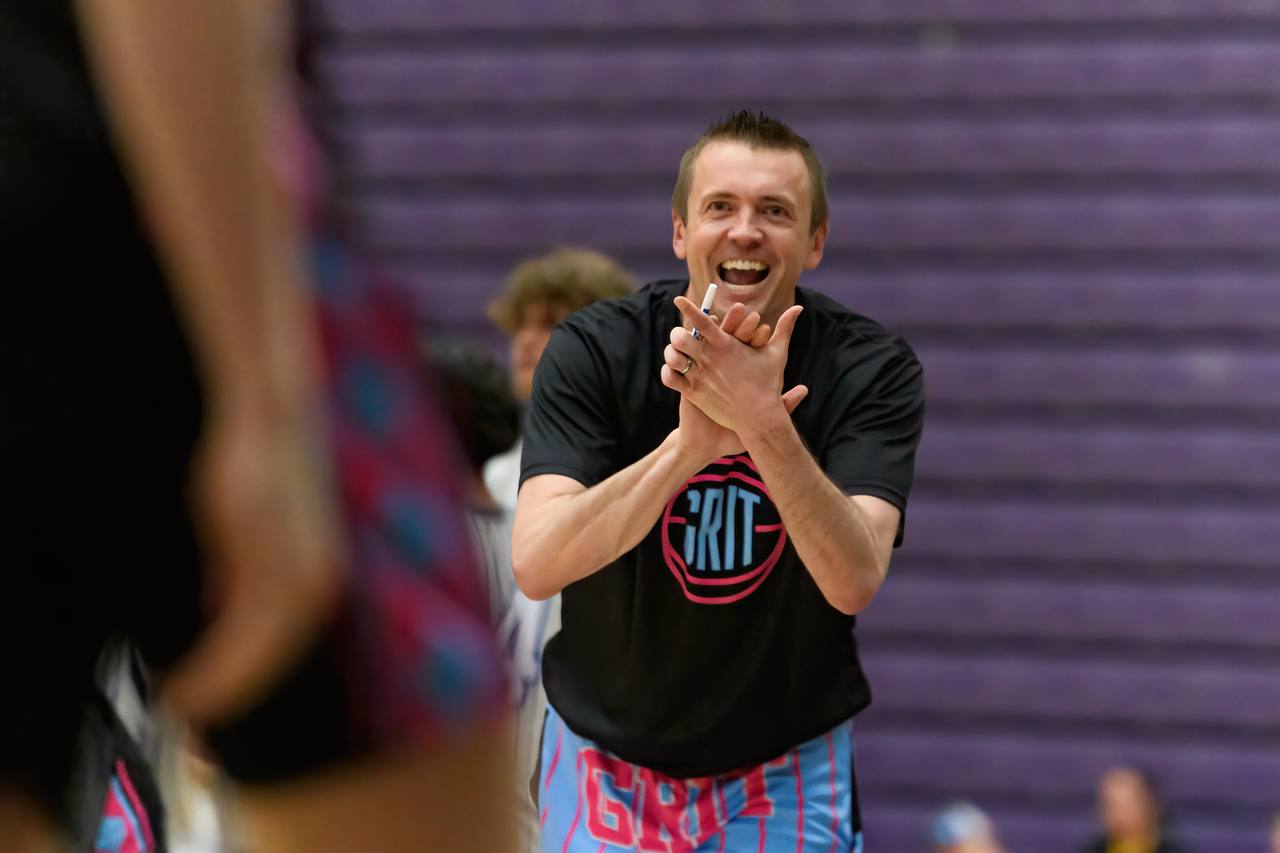 Coach Minor on the court in GRIT colors