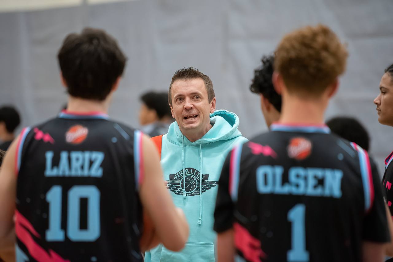 Coach Minor with the team